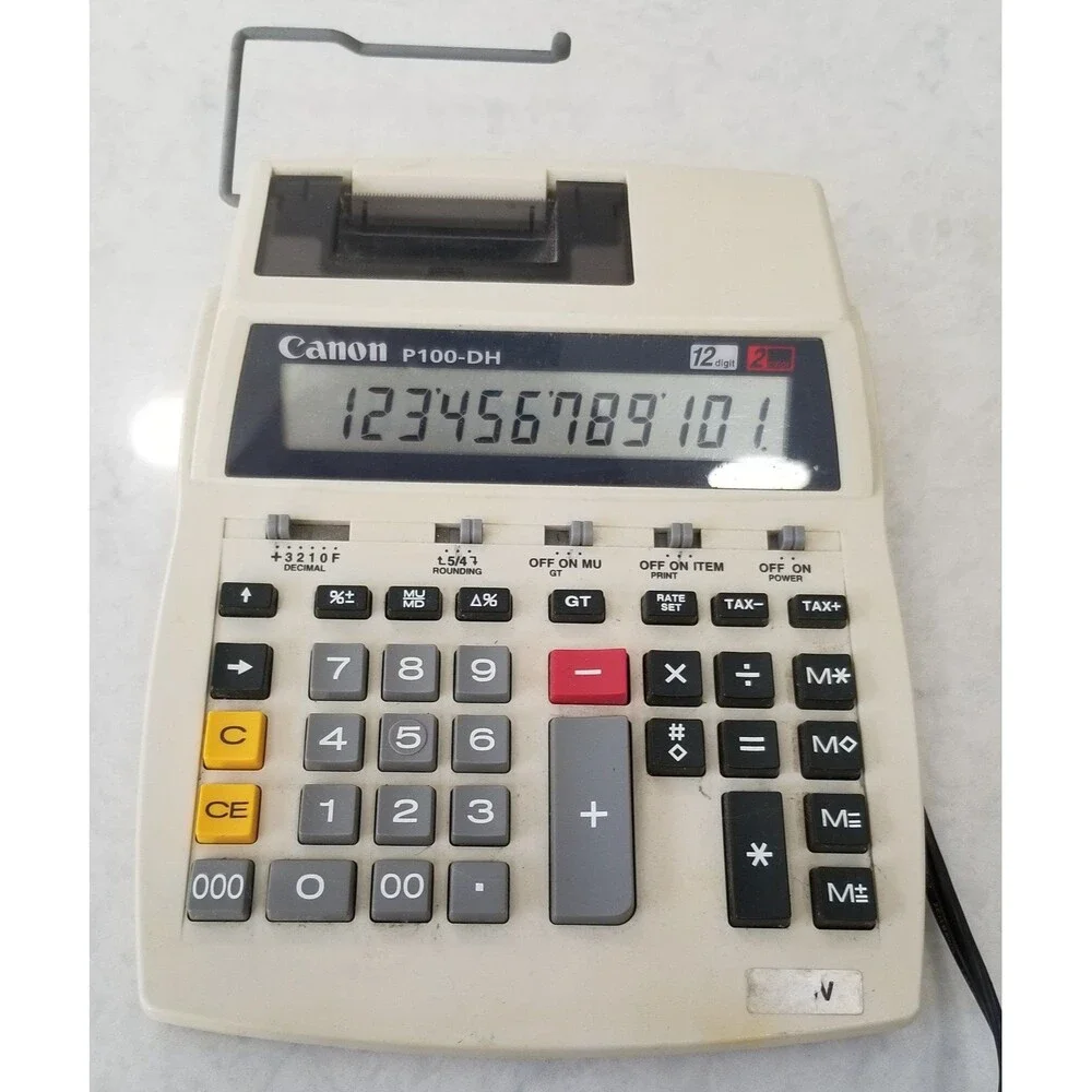 Canon p100-dh 12 characters printing Calculator works